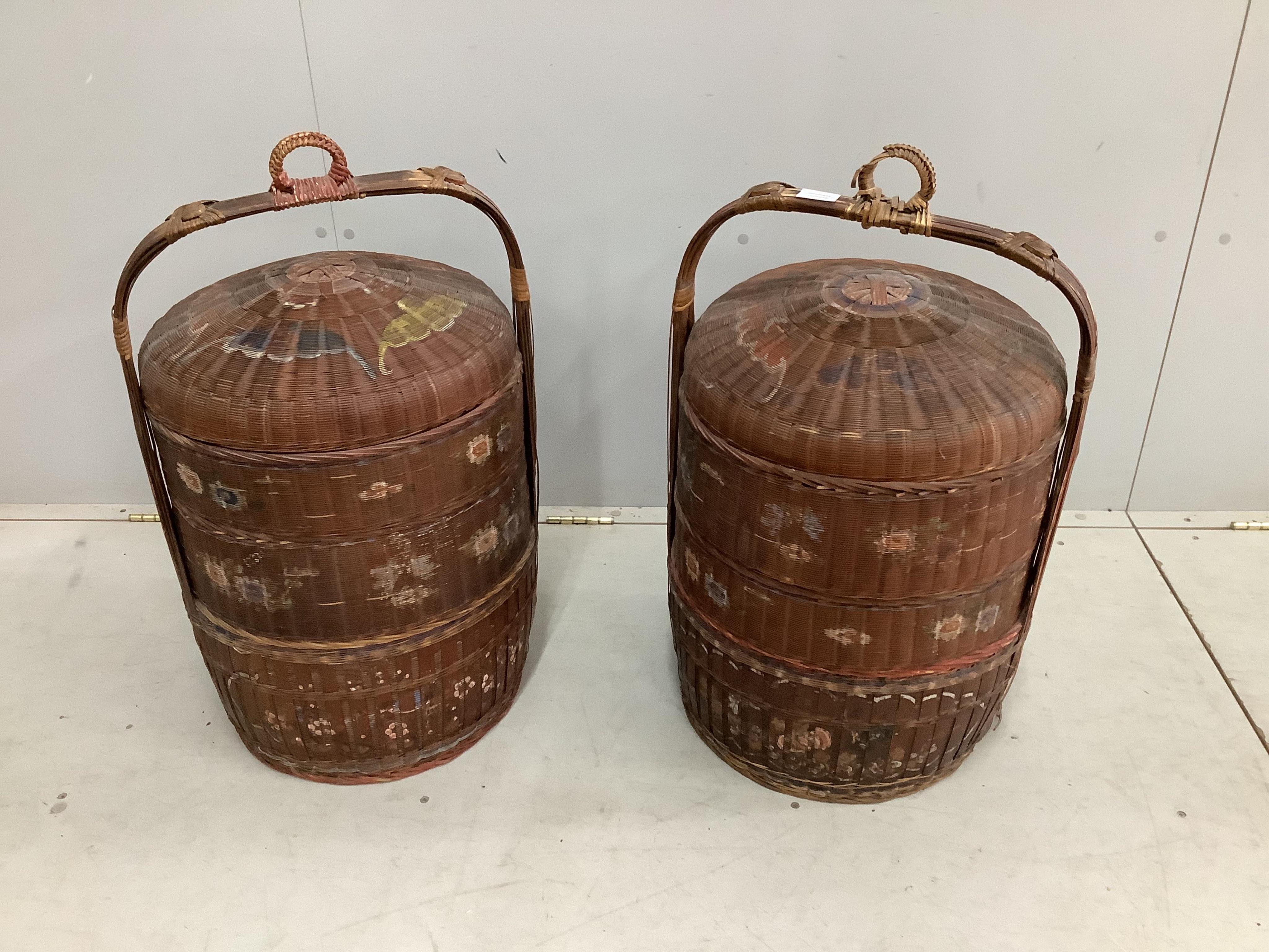 A pair of painted Japanese wedding baskets, height 70cm
